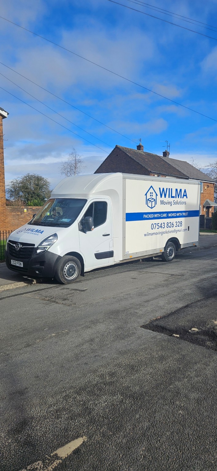 Wilma Moving Solutions van at a house move